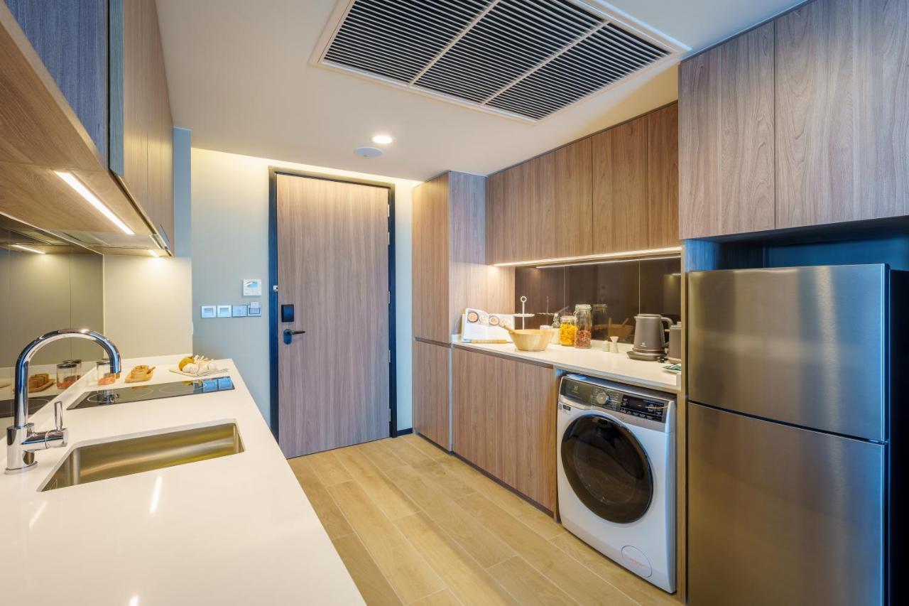 Somerset Pattaya Eksteriør billede A kitchen in a 3-bedroom unit