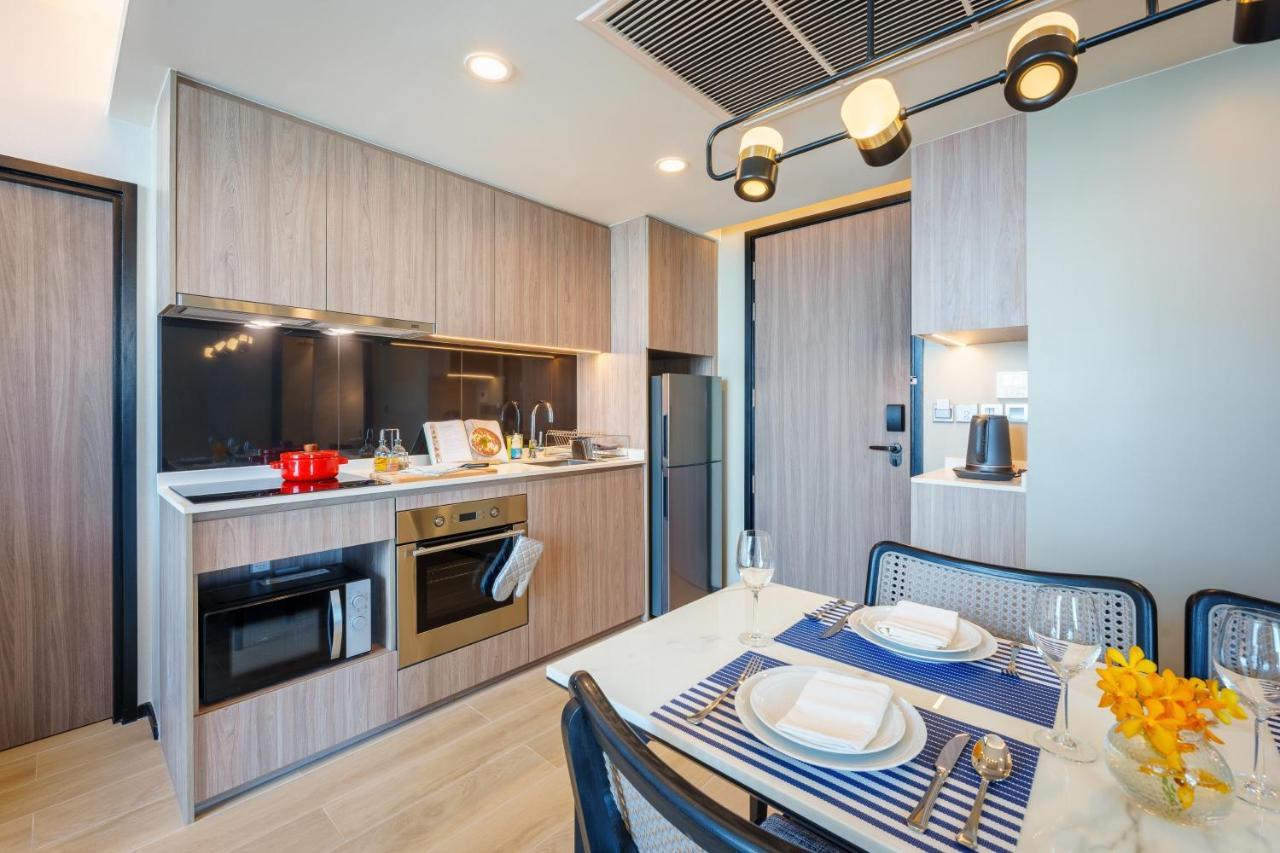 Somerset Pattaya Eksteriør billede A kitchen in a serviced apartment in Singapore